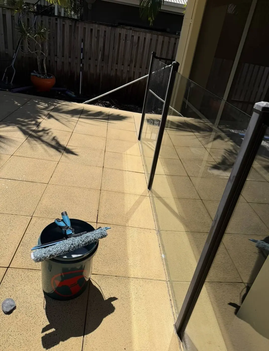 Glass pool fence cleaned streak-free