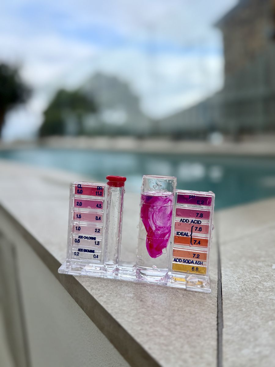 Full water chemistry test kit beside a Gold Coast pool